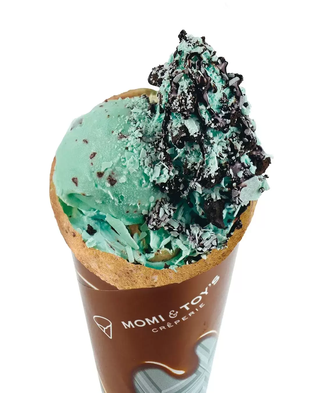 ミントアイスクリームとチョコレートチップがトッピングされたクレープのクローズアップ写真